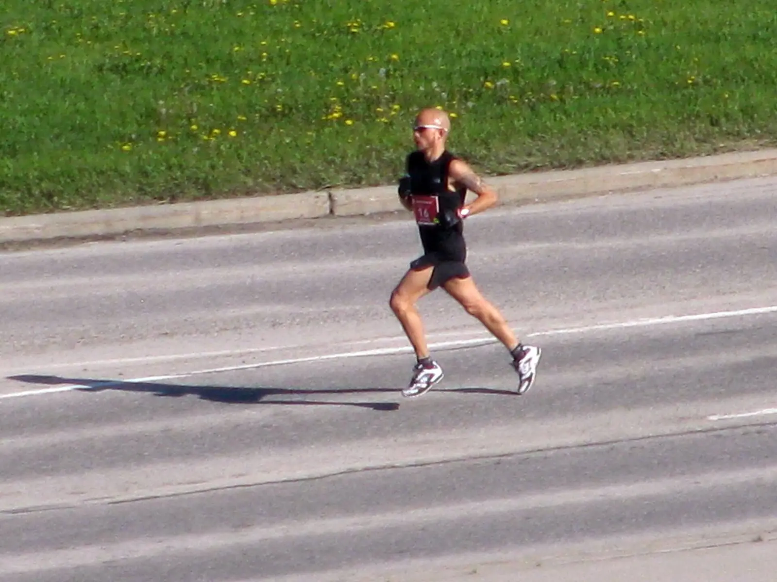 The lead runner on a Calgary road during the Calgary Marathon