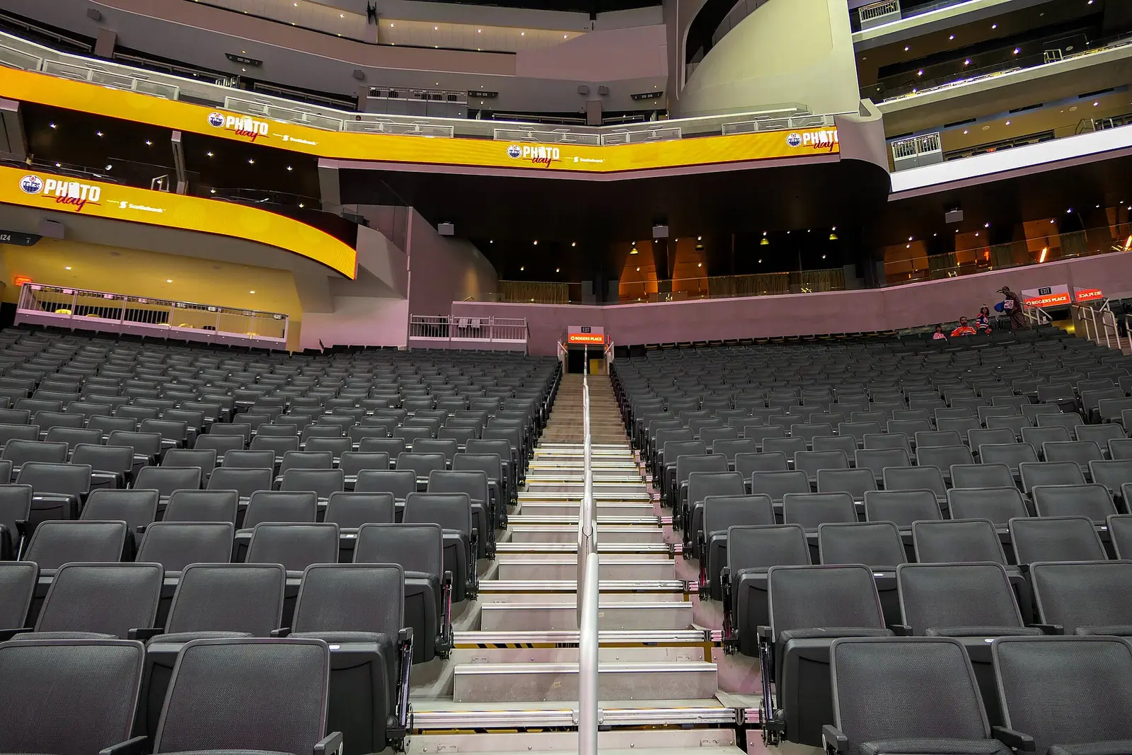 Rows of seats and the upper concourse inside Rogers Place in Edmonton